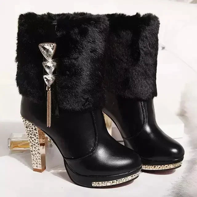 Black faux-fur ankle boots with high heels, platform soles, and rhinestone and crystal fringe details.