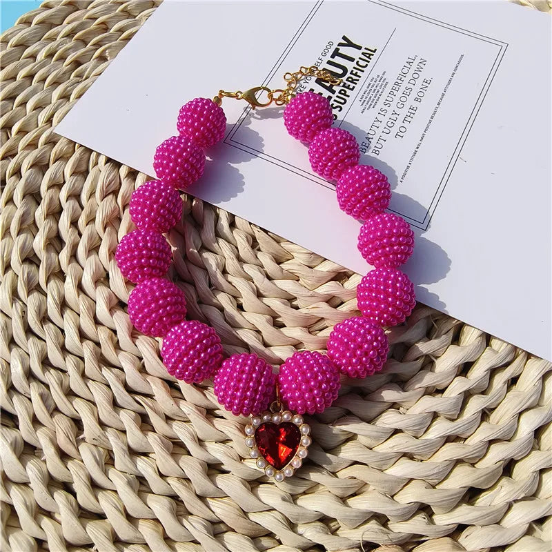 Heart-detail pet collar with pearl-style accents