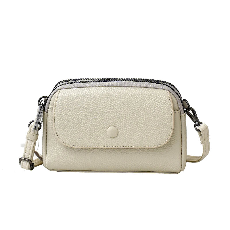 Women's phone crossbody bag with an interior zip pocket