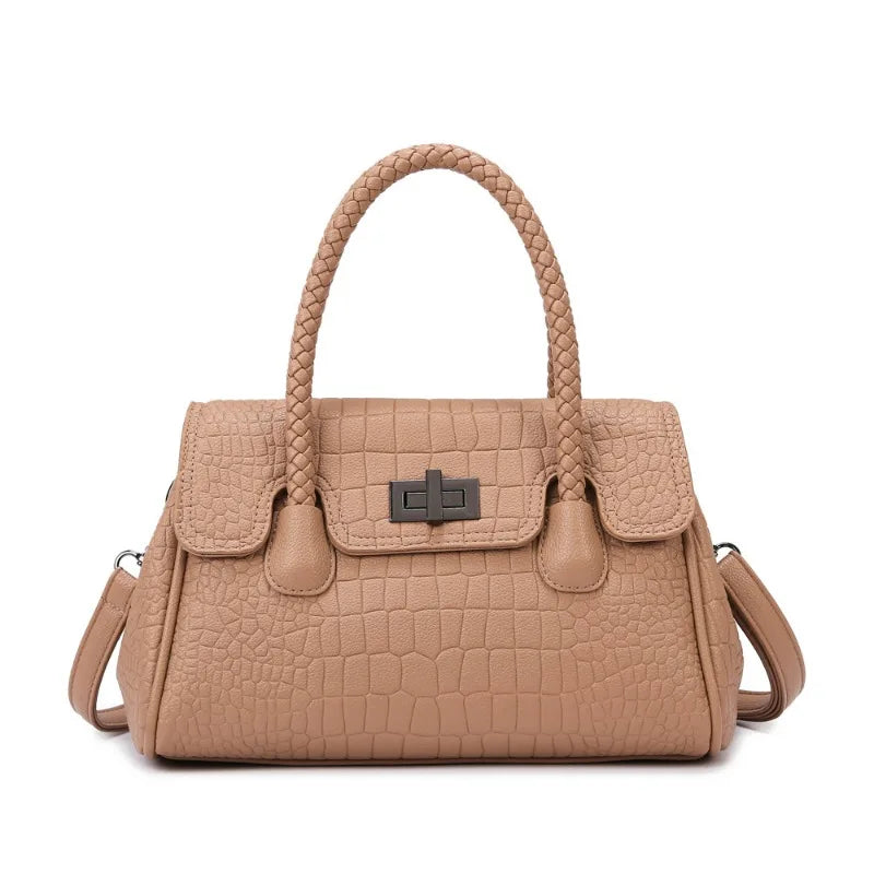 Beige faux leather crossbody bag with braided handle and textured finish for everyday use.