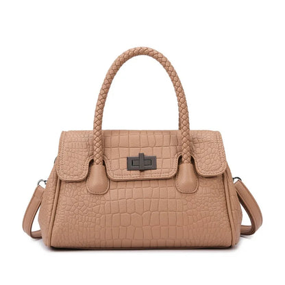 Beige faux leather crossbody bag with braided handle and textured finish for everyday use.