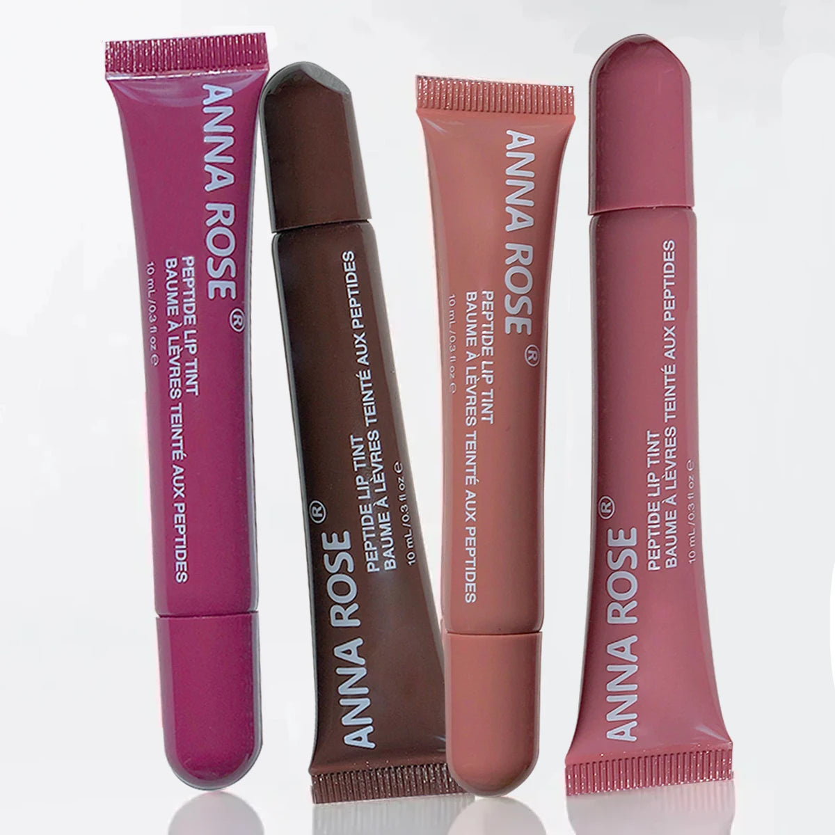 Lip gloss moisturizing peptide tinted squeeze tubes