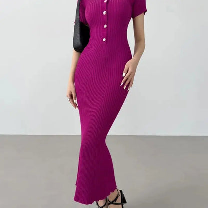 Fuchsia ribbed knit mermaid dress with a button-front detail, styled for resort wear.