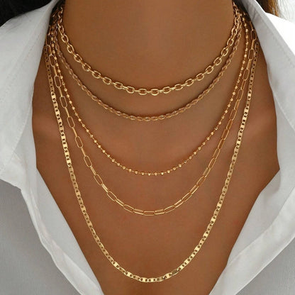 Women's Goldtone Necklace Set With Braided Bead Chains And Star Pendants In Five-Length Array