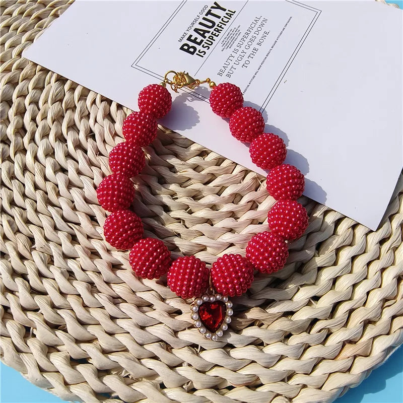 Heart-detail pet collar with pearl-style accents