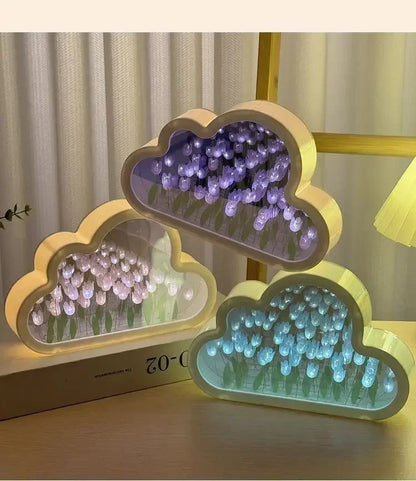 Cloud-shaped mirror lamps with colorful LED tulip flowers for ambient home decor desk lighting.