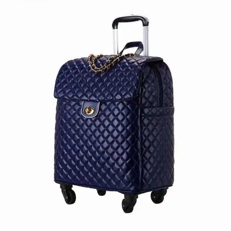 Navy blue quilted PU leather rolling luggage with gold chain detail, twist-lock flap, and a telescoping handle.