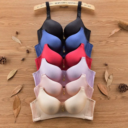 Multi-colored ribbed seamless sculpting bras with charms for everyday comfort.