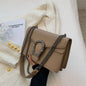 Textured Leather Crossbody Bag With Crocodile Pattern And Durable Build And Everyday Chain Strap