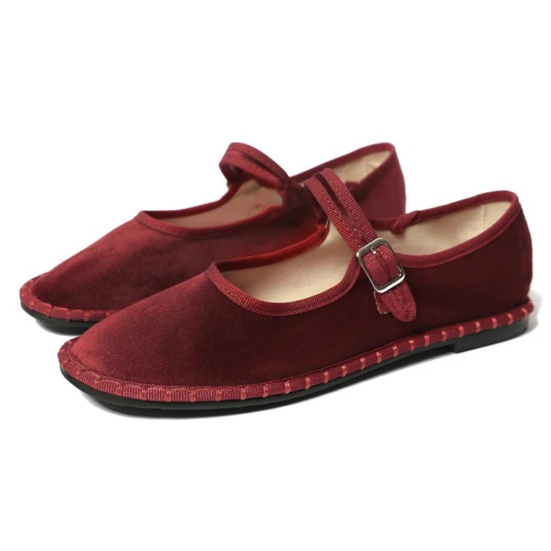 Women's floral-lined Mary Jane flats with buckle strap