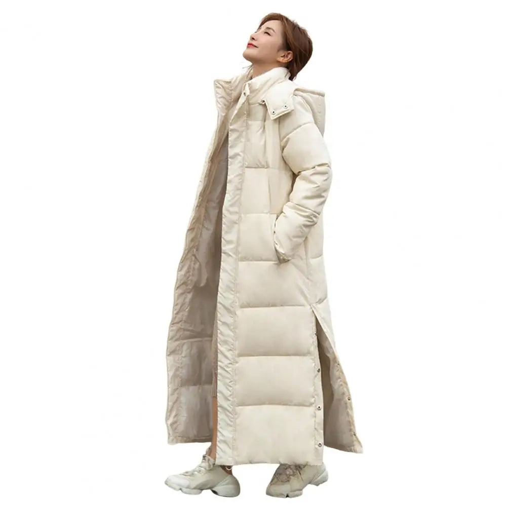 Women's long hooded coat with zip closure and side slits