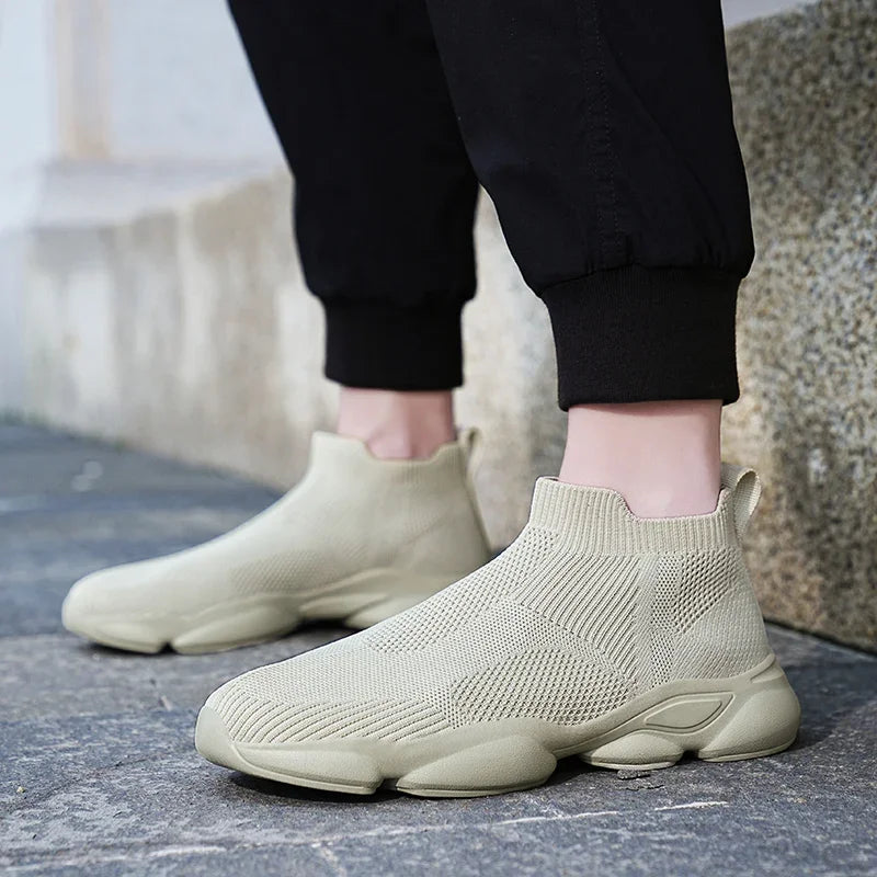 Beige knit fabric slip-on shoes with a cushioned sole for daily casual walking.