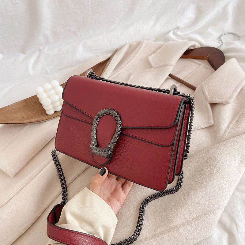 Textured Leather Crossbody Bag With Crocodile Pattern And Durable Build And Everyday Chain Strap