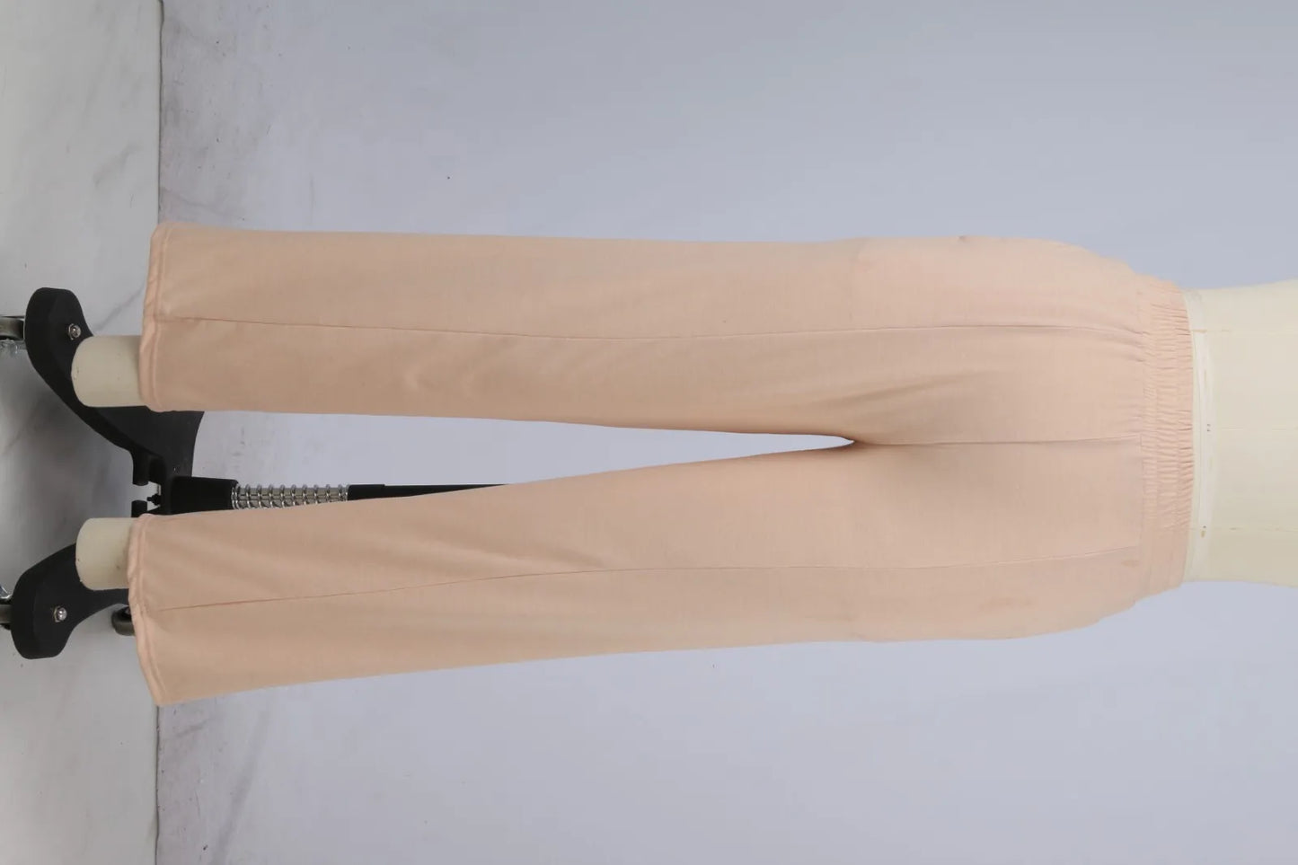Beige fleece-lined high waist wide leg pants for winter warmth.