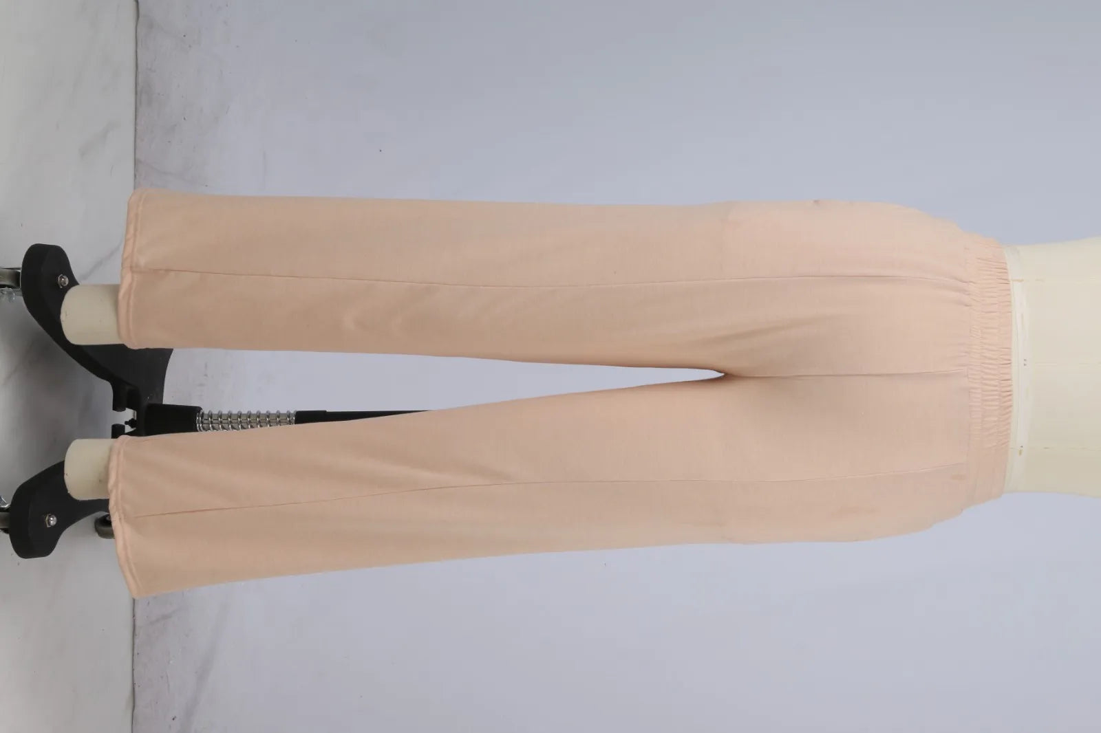 Beige fleece-lined high waist wide leg pants for winter warmth.