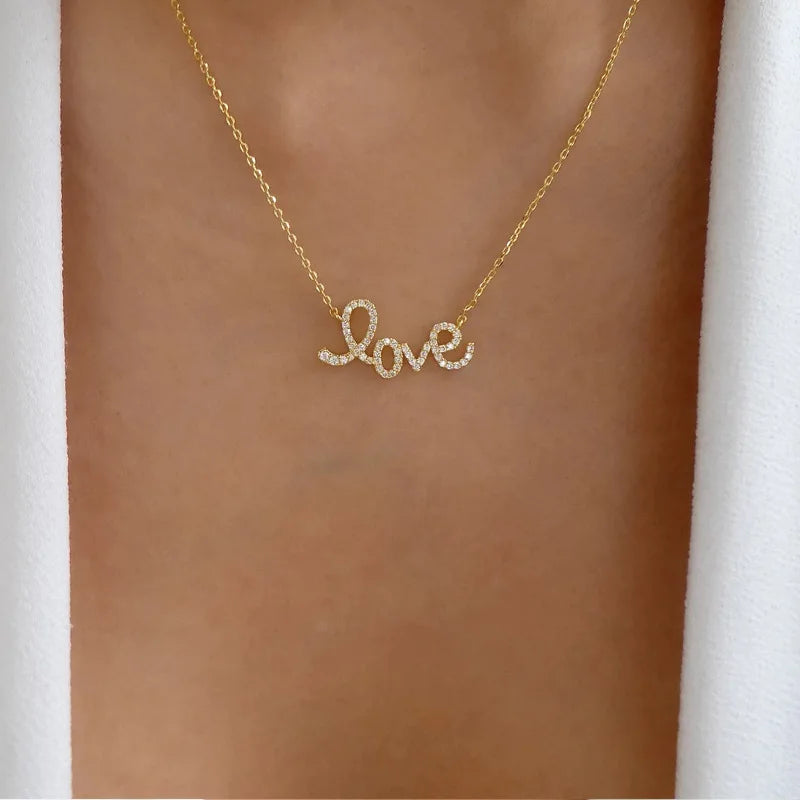 Necklace rhinestone love pendant with a crystal letter script design on a thin chain