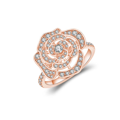 Rose gold-plated 925 silver camellia flower ring, pave-set with moissanite crystals and a central diamond.