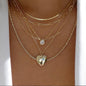 Women's Goldtone Necklace Set With Braided Bead Chains And Star Pendants In Five-Length Array
