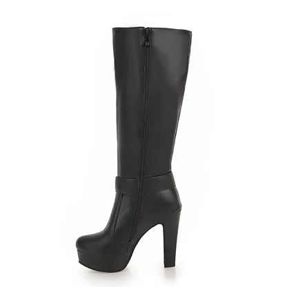 Black knee-high platform boot with high heel, side zipper, and ankle strap.