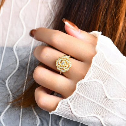 Rose gold-plated 925 silver flower ring, paved with sparkling moissanite stones in a camellia design.