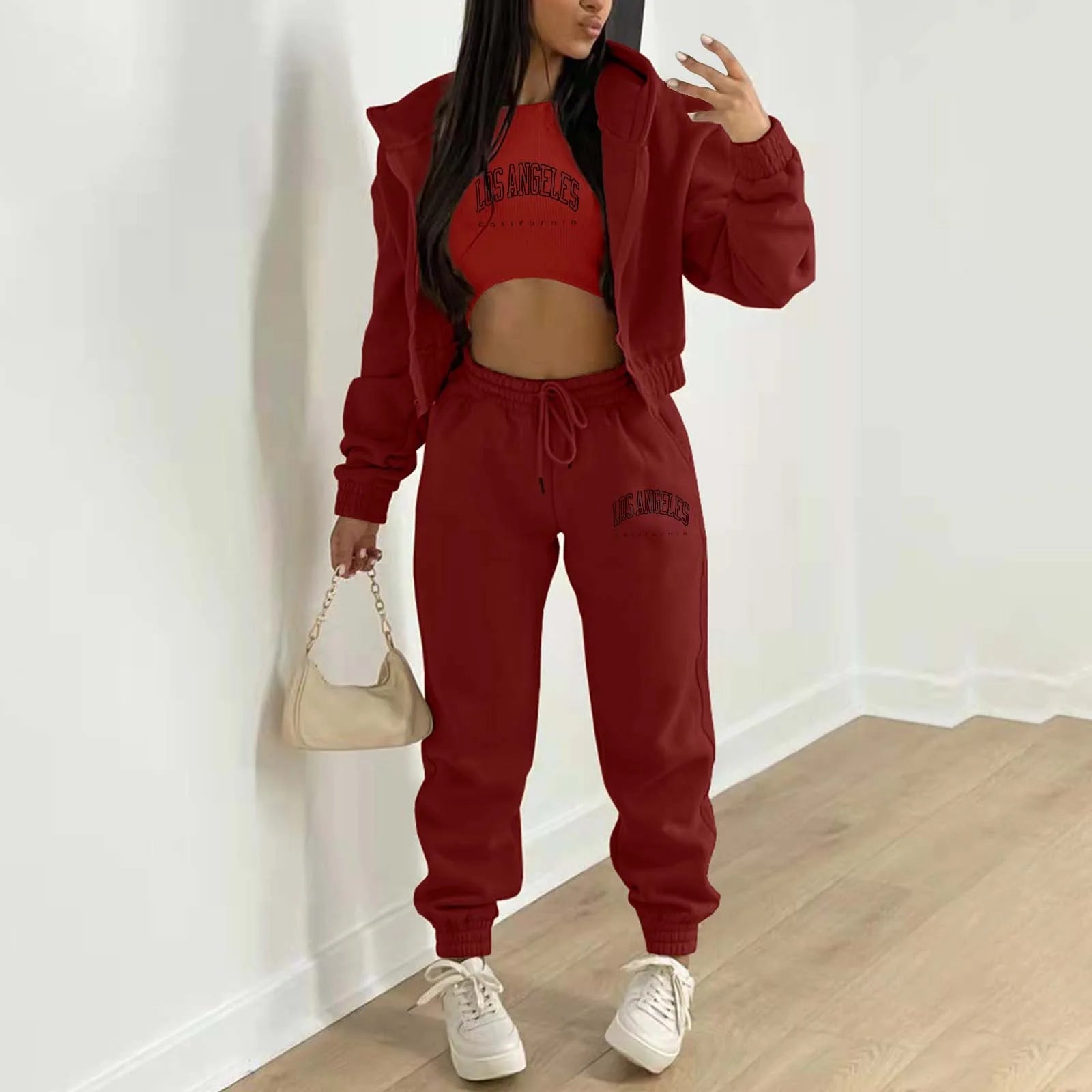 Red knit hooded sweater set with letter print and relaxed jogger pants for lounging.