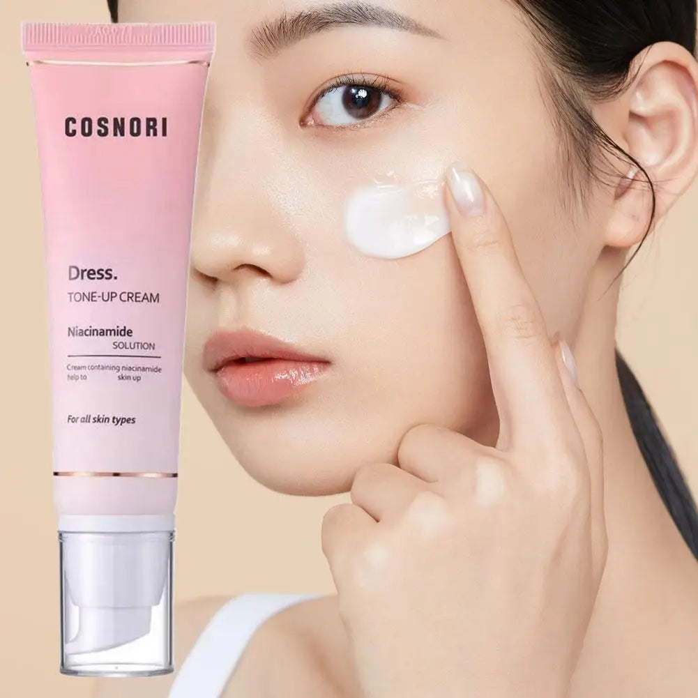 Tone up cream niacinamide brightening makeup base daily moisturizer in squeeze tube applied to face