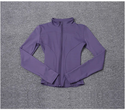 Purple long sleeve fitted sports jacket with zip-up front and high collar for gym training and yoga.