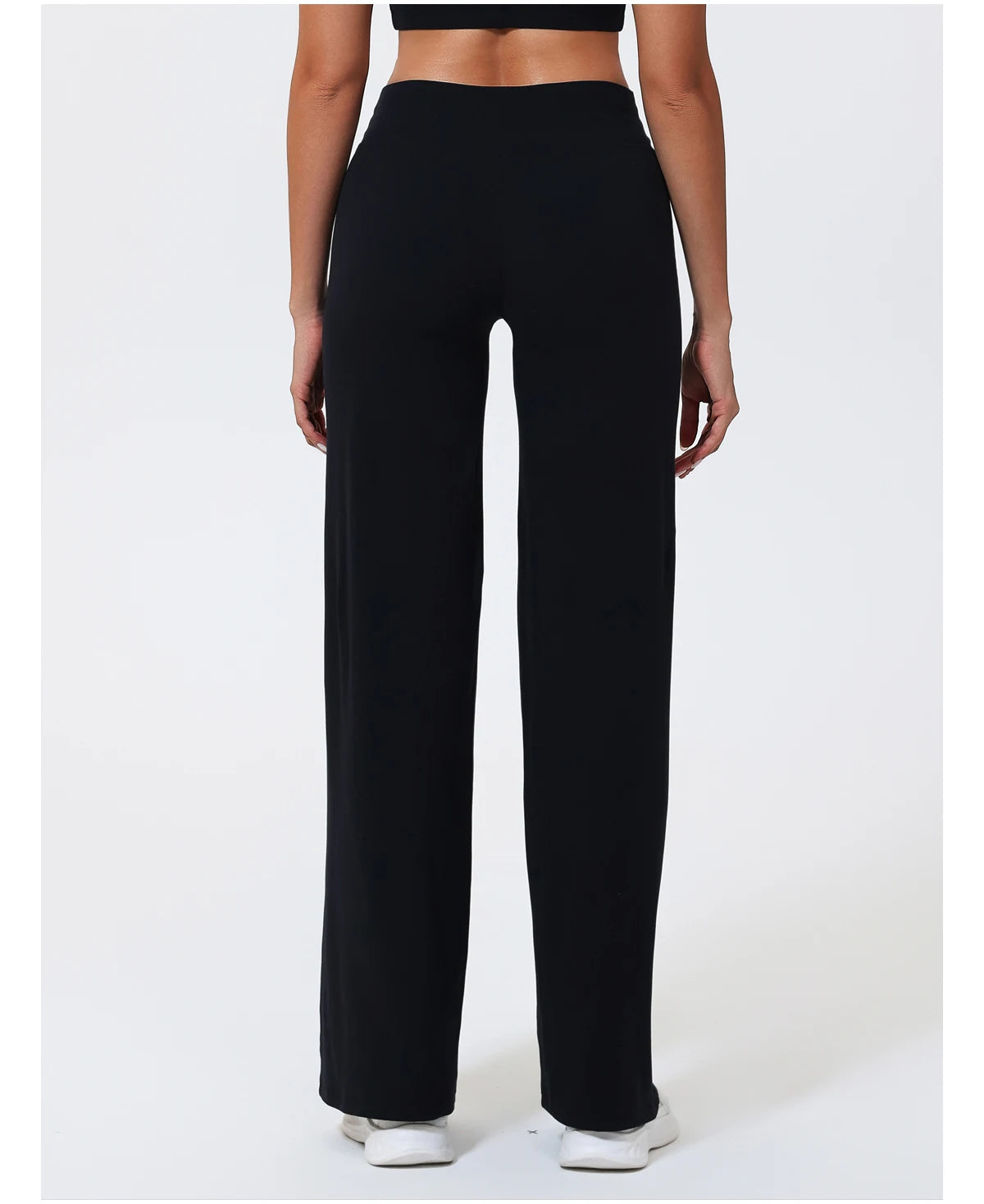 Black high-waist knit compression leggings in a sculpting fit for workouts.