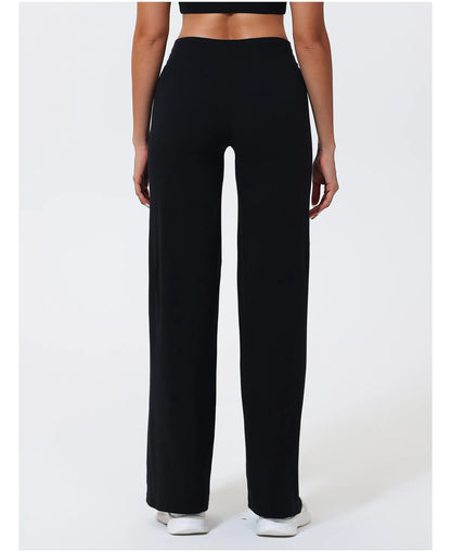 Black high-waist knit compression leggings in a sculpting fit for workouts.