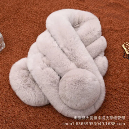 Light gray rabbit fur scarf with a triple-tube design and a pom-pom accent.