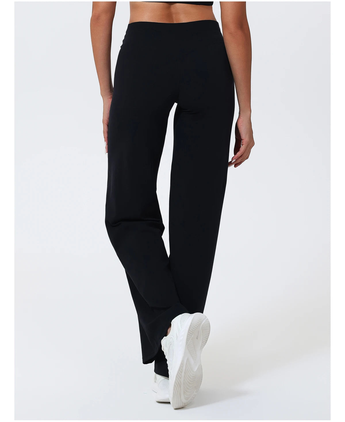 Black high waist sculpting leggings in stretchy knit fabric for athletic training.