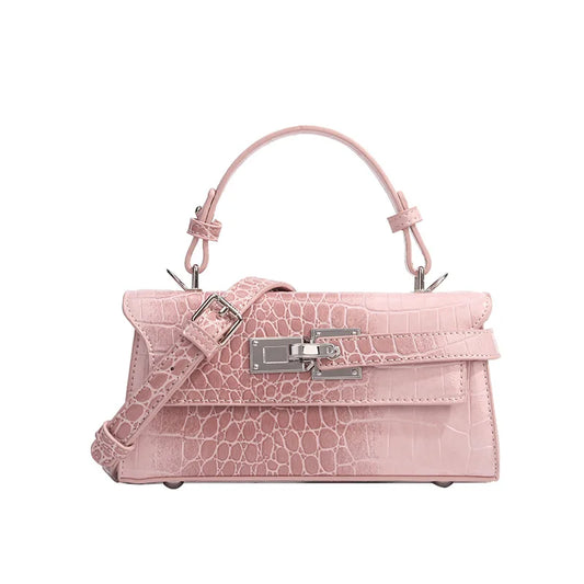 Light pink faux leather structured crossbody with an adjustable strap and zip closure for daily essentials.