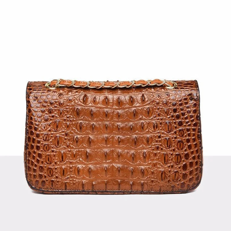Textured Leather Crossbody Bag With Crocodile Pattern And Durable Build And Everyday Chain Strap