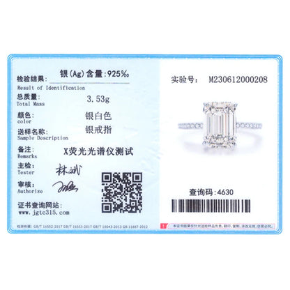 Silver ring authenticity certificate displaying text, a QR code, and a small photo of a rectangular zirconia ring.