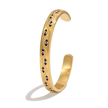 Women’s stainless steel cuff bracelet with an evil eye motif