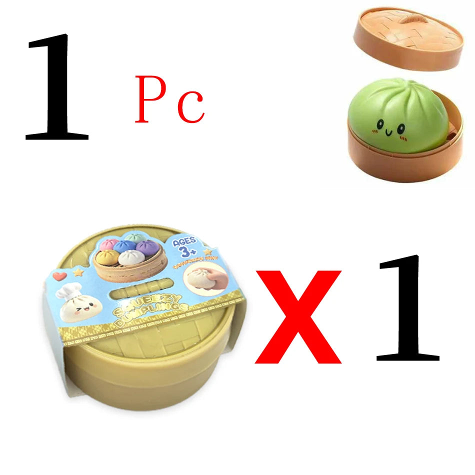 Green silicone dumpling toy with cute face in a brown plastic steamer box as a mystery collectible fidget toy.