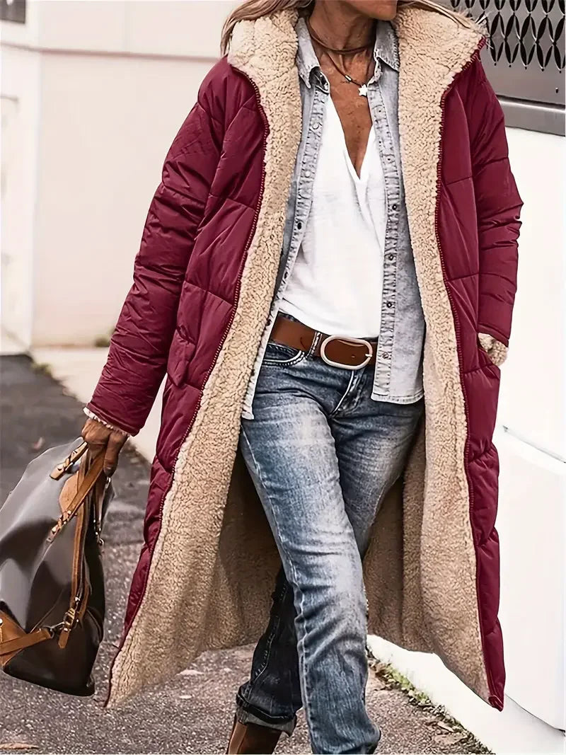 Women’s long hooded coat with zipper closure and pockets