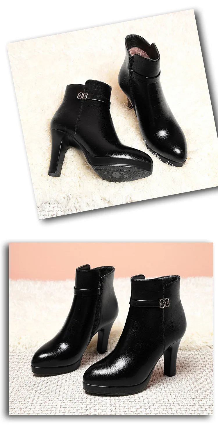 Black leather block heel ankle boots with platform sole and rhinestone buckle strap.