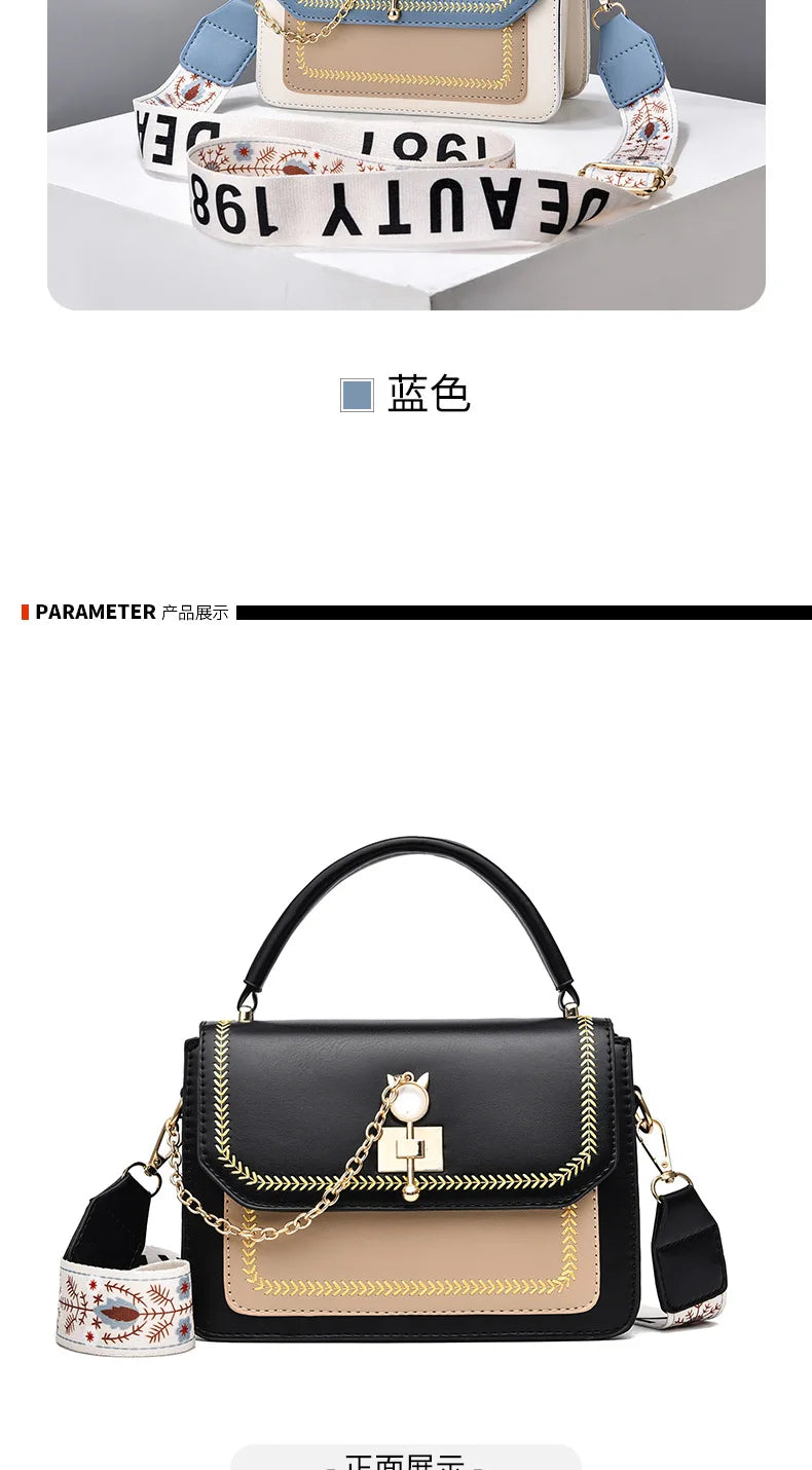 Black and beige leather shoulder bag with gold chain, top handle, and patterned strap.