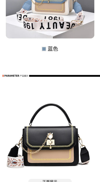 Black and beige leather shoulder bag with gold chain, top handle, and patterned strap.