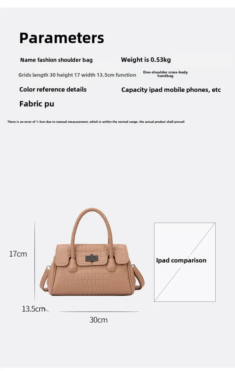 Tan faux leather crossbody bag with crocodile texture, braided handle, and metal clasp for everyday carry.