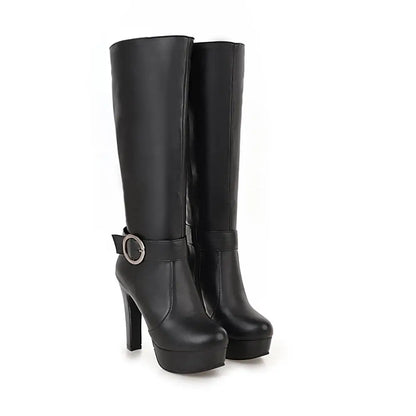 Black leather knee-high platform boots with chunky high heels and a decorative ankle strap and buckle.