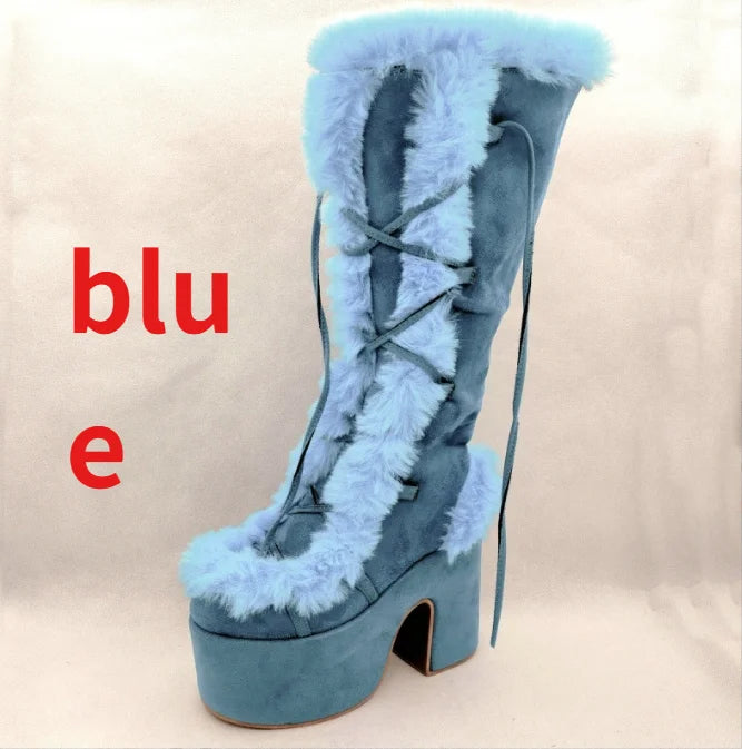 Blue suede platform mid-calf boot with faux fur trim, lace-up front, and block heel.
