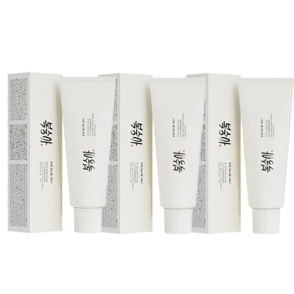 Three white SPF50+ rice extract moisturizing cream tubes with matching boxes, featuring black text and red stamps.