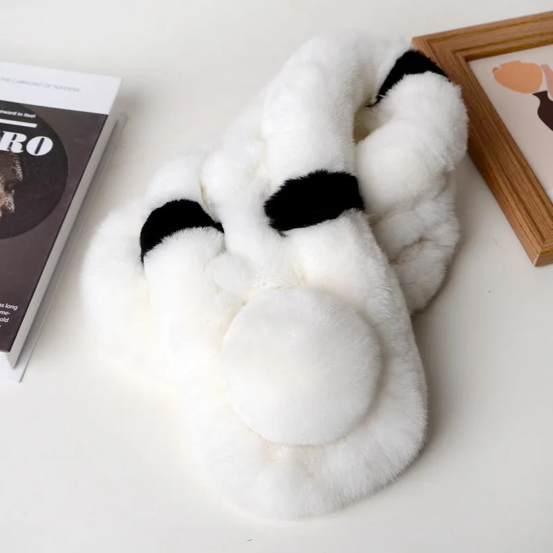 Thick white faux fur triple-tube scarf with black accent stripes and a fluffy pom pom.