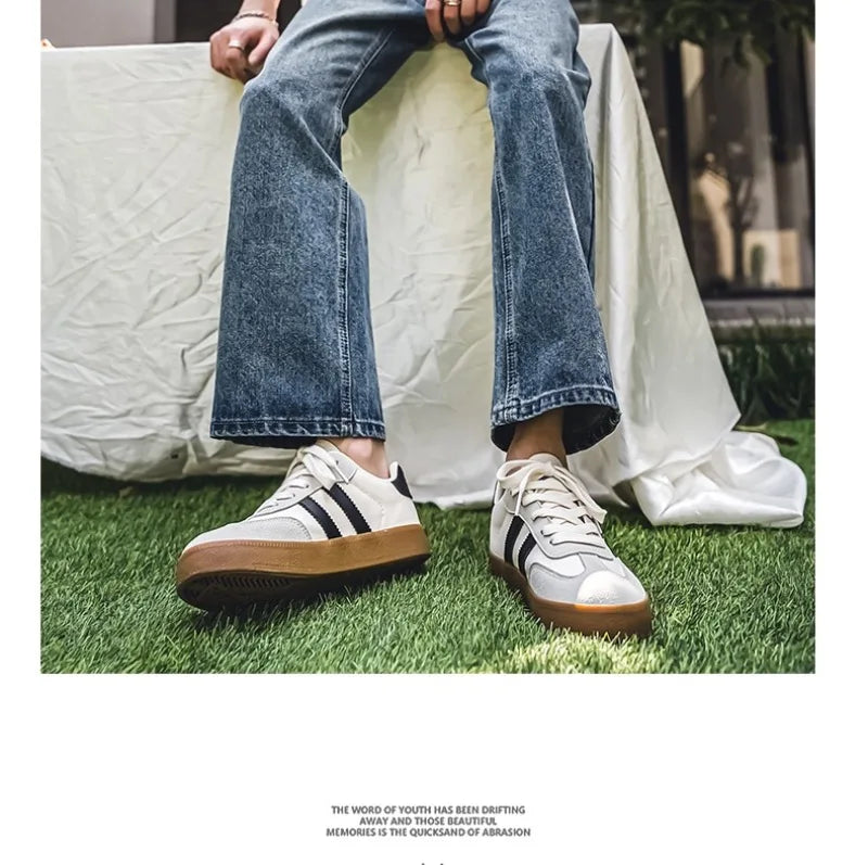 White canvas sneakers with black stripes and brown rubber soles, breathable casual training shoes for daily wear.