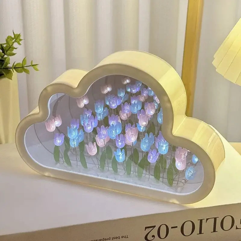 Cloud-shaped crystal glass lamp with pink and blue tulip motifs and LED glow for ambient desk lighting.