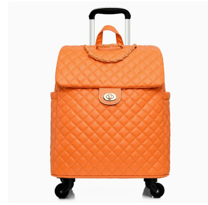 Orange quilted faux leather rolling travel bag with gold chain accent, top handle, and extendable trolley handle.