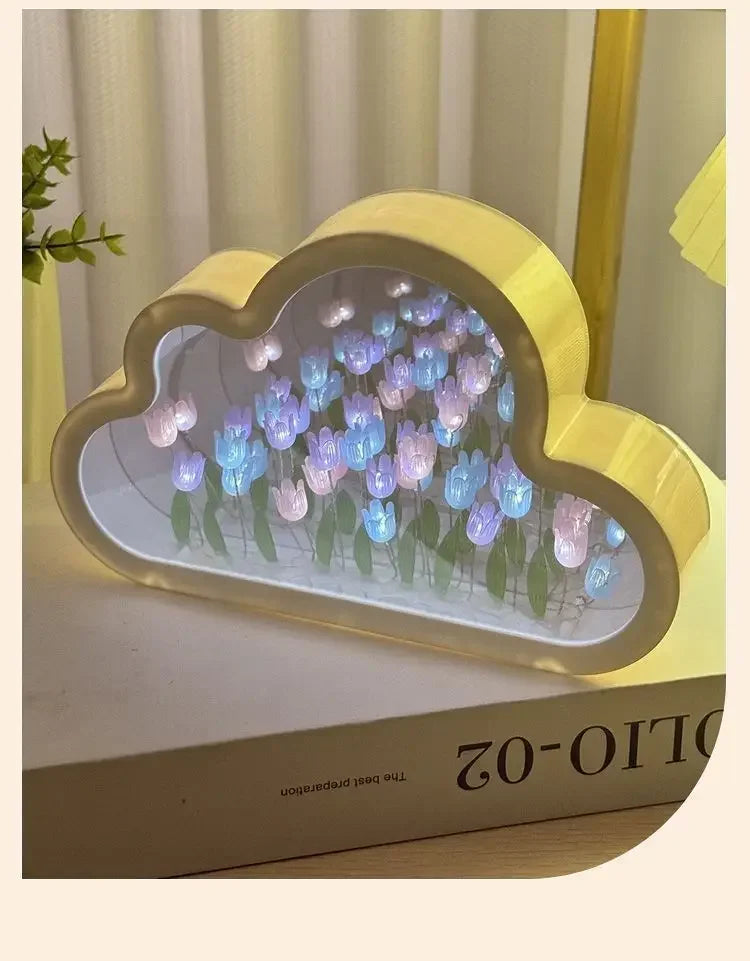 Yellow cloud-shaped LED desk night light with pink and blue crystal tulips for gentle ambient room lighting.