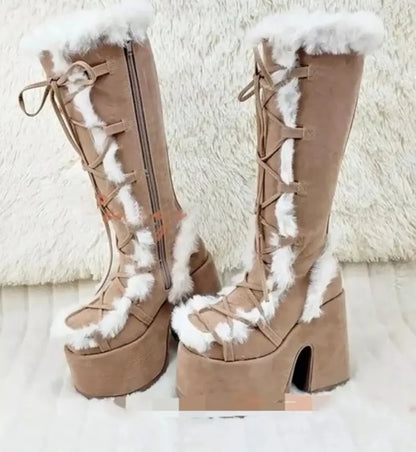 Brown suede mid-calf platform wedge boots with white faux fur trim, lace-up fronts, and side zippers.